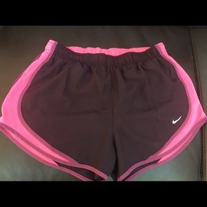 Nike running shorts Eggplant and pink.